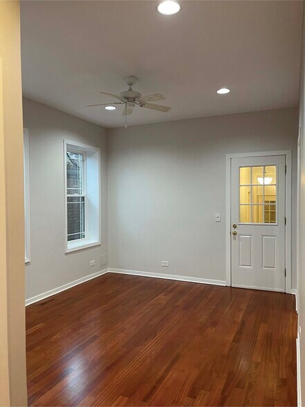 Livingroom with celing fan - 2216 W Belmont Ave