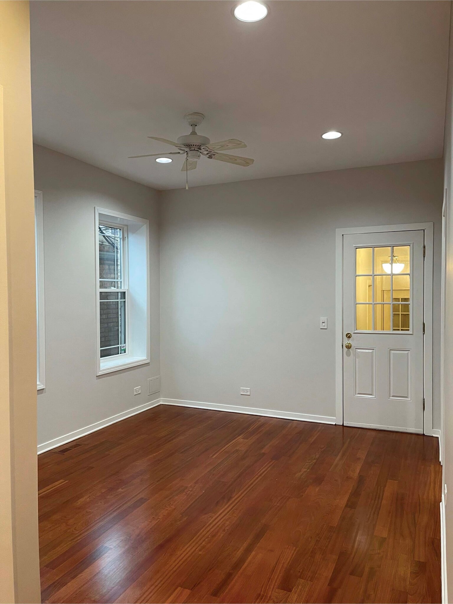Livingroom with celing fan - 2216 W Belmont Ave