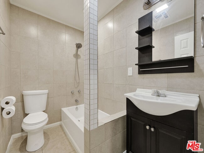 Building Photo - 6842 Ranchito Ave