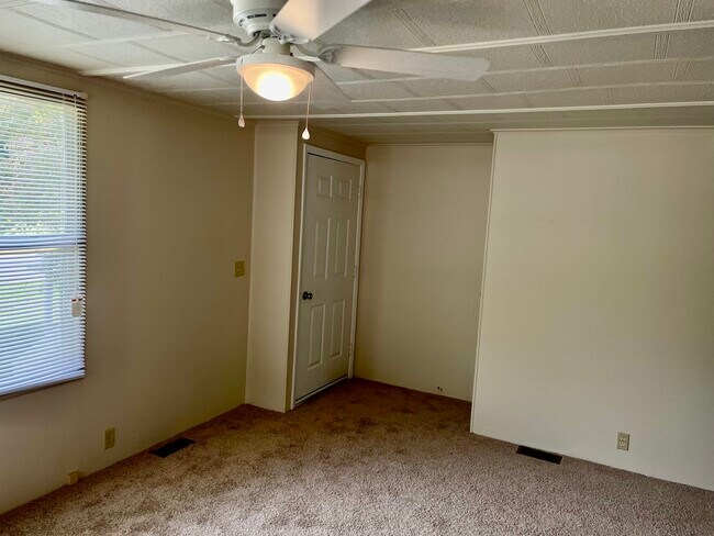 Living Room Front Door and Closet - 311 Rugby Rd