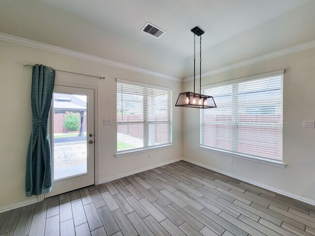 Building Photo - This thoughtfully designed home boasts 4 spacious bedrooms (2 down) and 3.5 baths, providing ampl...