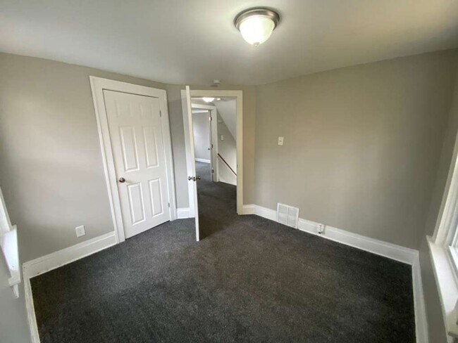 Building Photo - Move-In Special – $300 rent credit after 6 months of on-time payments!