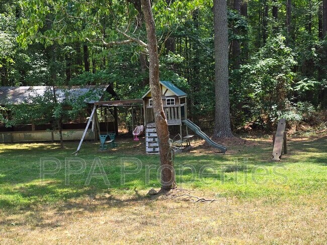 Building Photo - 7122 Ramblewood Dr