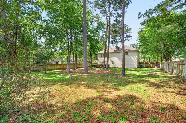 Building Photo - 6535 Woodland Oaks