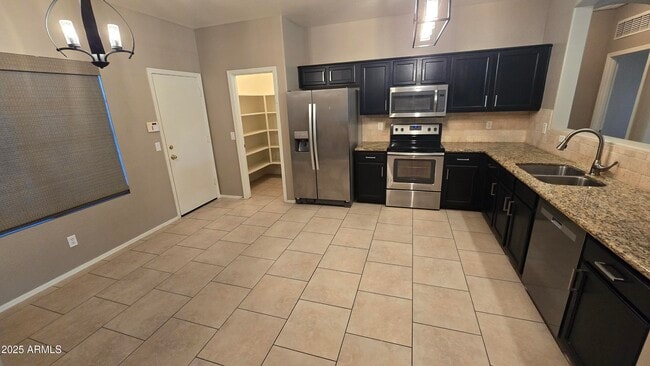 Building Photo - 17848 W Acapulco Ln