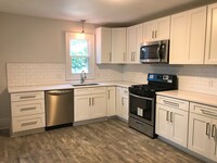 Building Photo - *GORGEOUS, completely updated single famil...