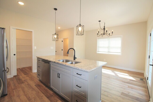 Building Photo - Spacious 4 Bedroom, 3.5 Bath Townhome with...