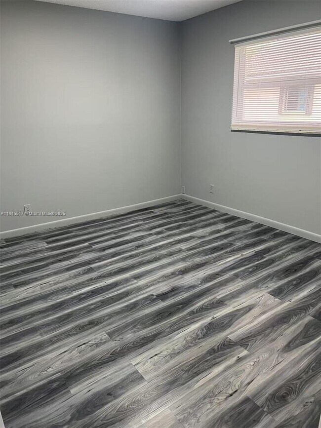 Building Photo - 3100 Coral Springs Dr