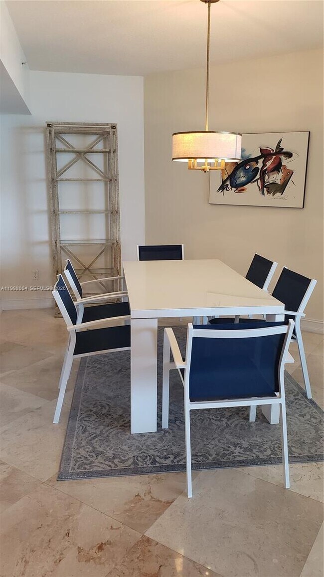 Building Photo - 16699 Collins Ave