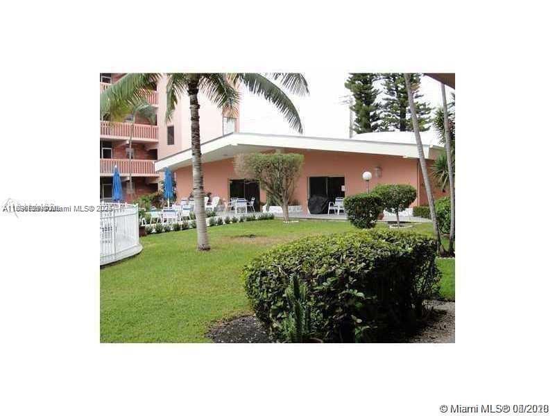 Building Photo - 180 NE 12th Ave