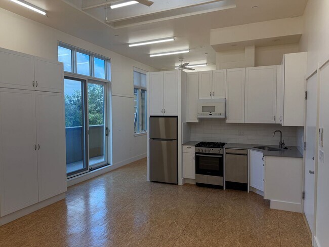 Building Photo - Bright Live-Work Studio with Deck & Tall Ceilings off Lowell Street in Oakland