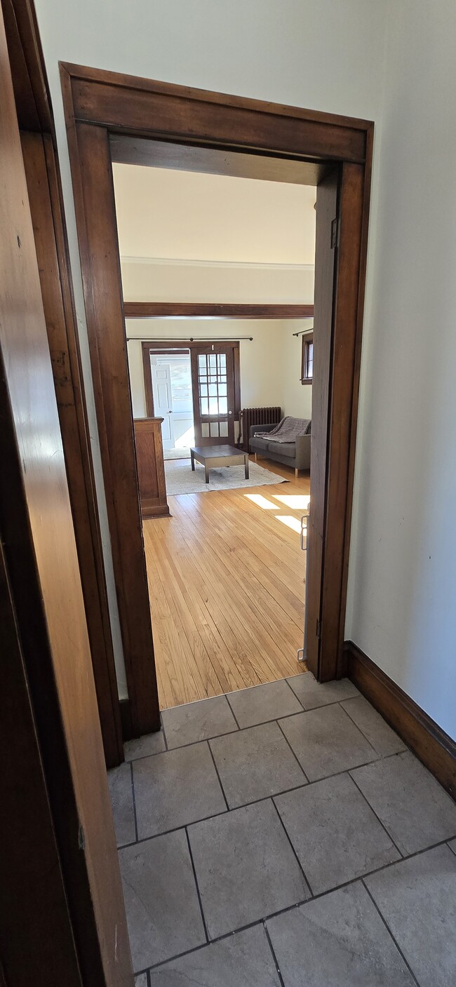 Looking from hallway into dining and living rooms. - 533 Smith Ave S