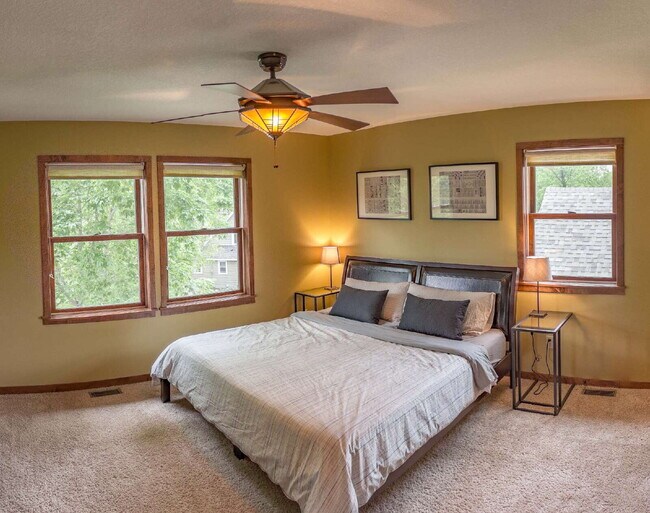 Building Photo - Spacious 5-Bedroom Minneapolis Gem with Gas Fireplace & Finished Basement