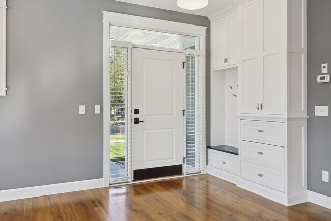 Granite bench and antique coat hangers. - 924 Eleanor Ave