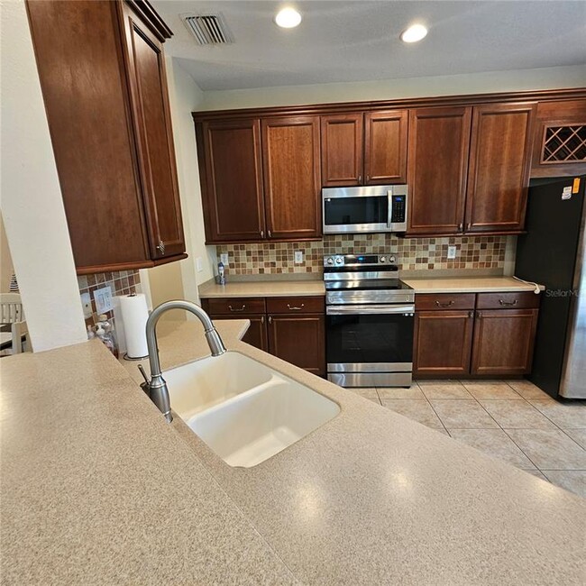 Building Photo - 8110 Villa Grande Ct