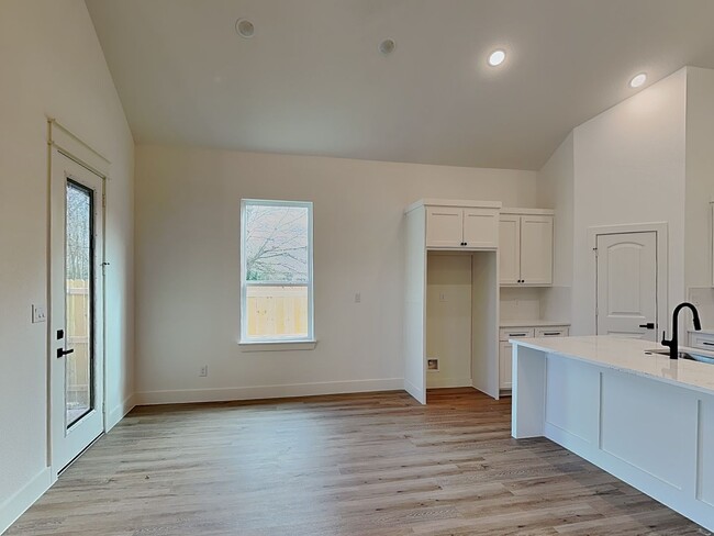 Building Photo - Brand New Modern Luxury with Soaring Ceilings & Designer Finishes! ***Limited-Time Offer: 1 Month...