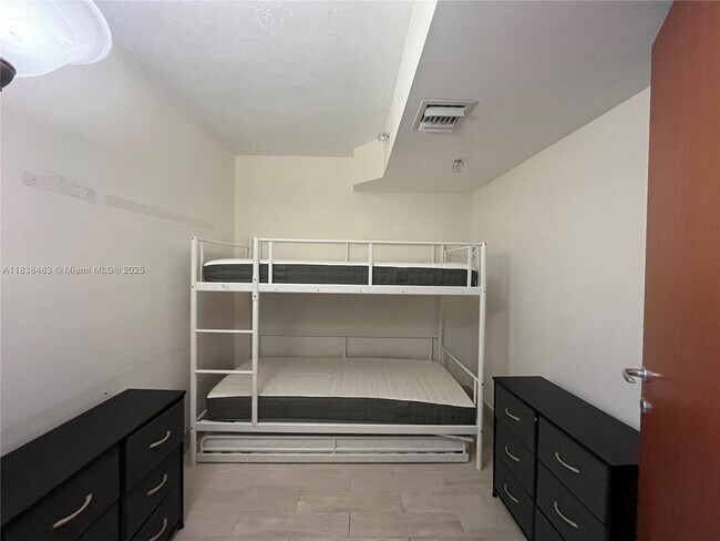 Building Photo - 9499 Collins Ave