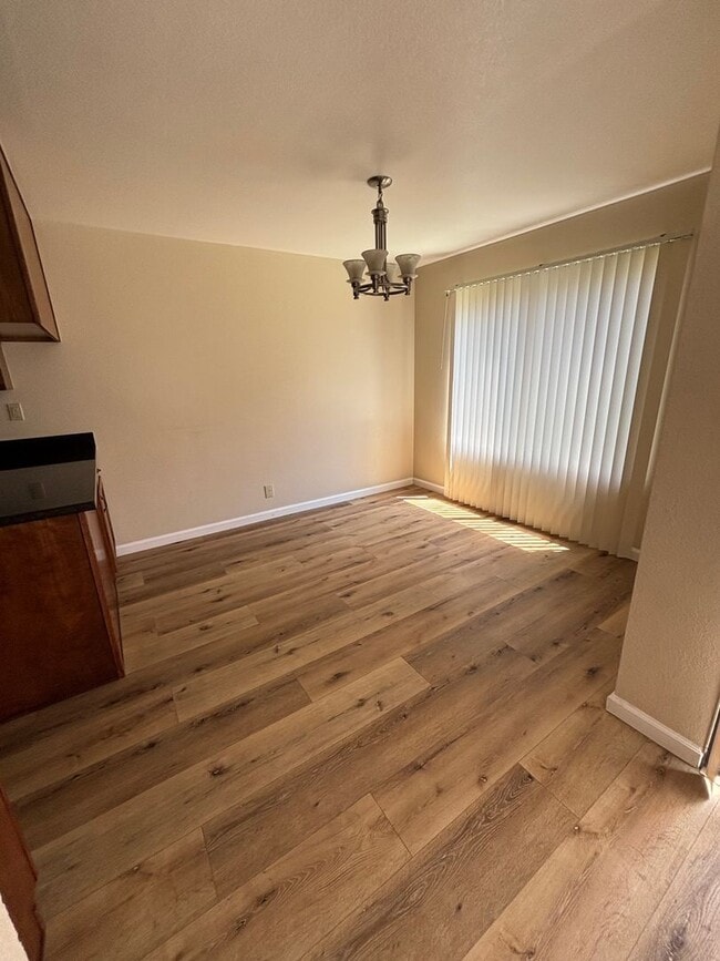 Building Photo - Spacious 4-Bedroom Home with Community Poo...