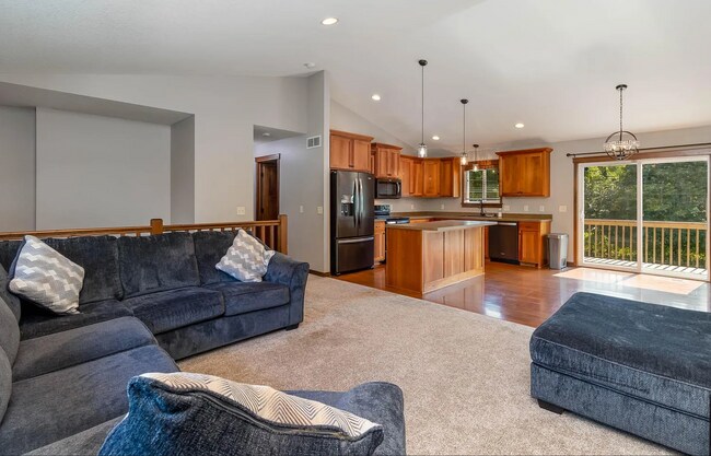 Building Photo - Modern 4BR Home with Fenced Yard + Garage ...