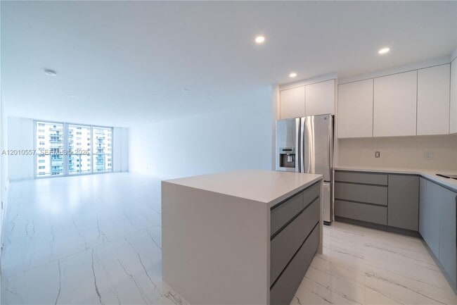 Building Photo - 19380 Collins Ave