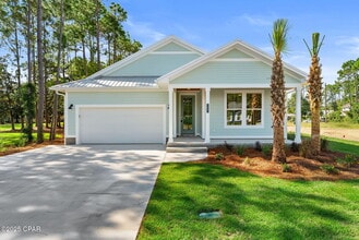 Building Photo - 7021 N Lagoon Dr