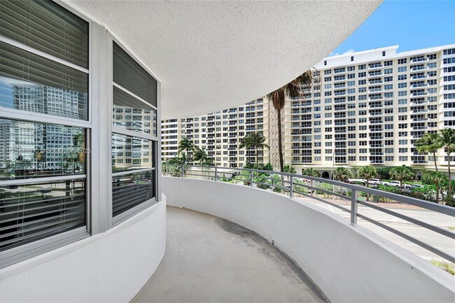 Building Photo - 5555 Collins Ave