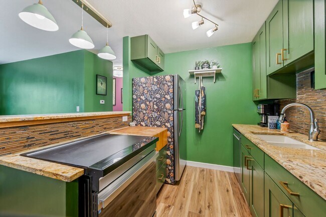 Building Photo - Lovingly Upgraded 2-Bedroom 3rd Floor Condo in Central Fort Collins With Abundant Personality