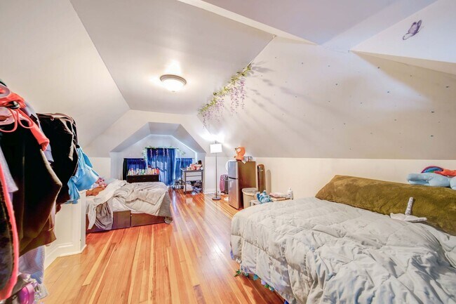 Building Photo - Charming 5-Bedroom Home with Exposed Brick and Modern Upgrades