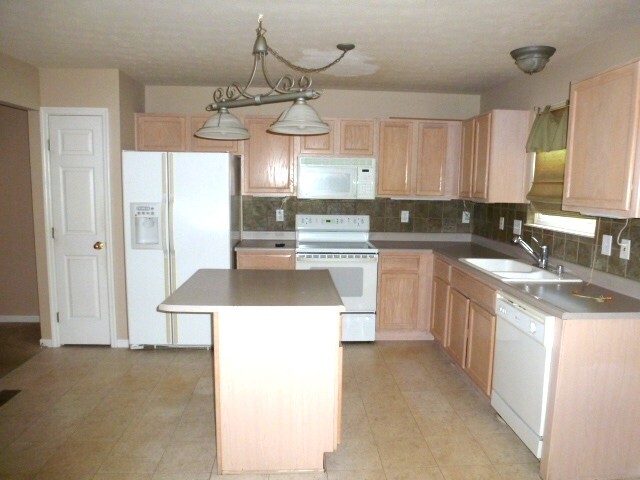 Building Photo - 1004 Wild Flower Ln