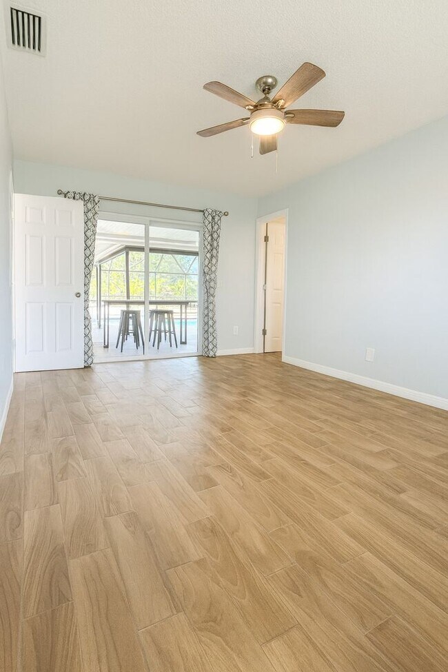 Building Photo - Stunning 3-Bedroom Pool Home in Lehigh – Completely Renovated with Resort-Style Living!