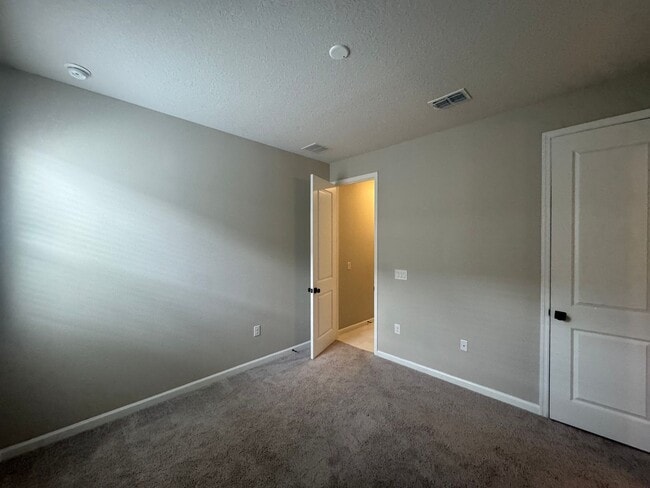 Building Photo - Where Modern Comfort Meets 4BD/3BA Hometown Charm — Your Story Begins in Okahumpka! FULLY-FENCED!...