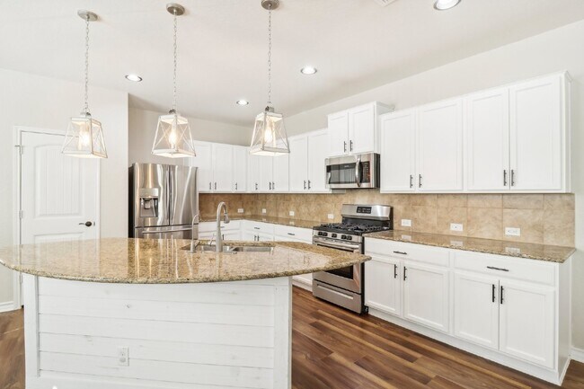 Building Photo - "Charming 4-Bedroom Oasis with custom fini...