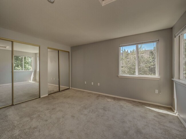 Building Photo - Spacious 3 Bedroom, 2 Bath Apartment with Washer & Dryer, Private Patio & Garage Options!
