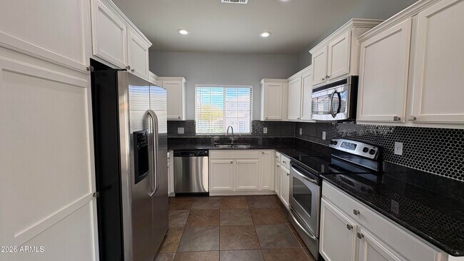 Building Photo - 5396 W Molly Ln