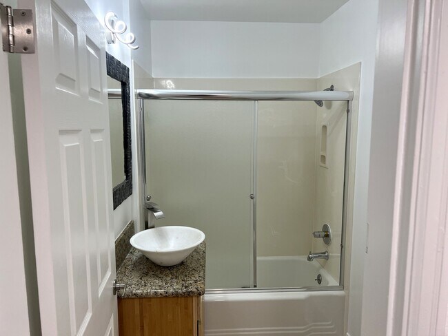 main floor bathroom from entry - 4662 Carman Dr