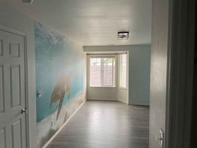 Building Photo - Spacious and well-maintained 3-bedroom, 2-bathroom condo