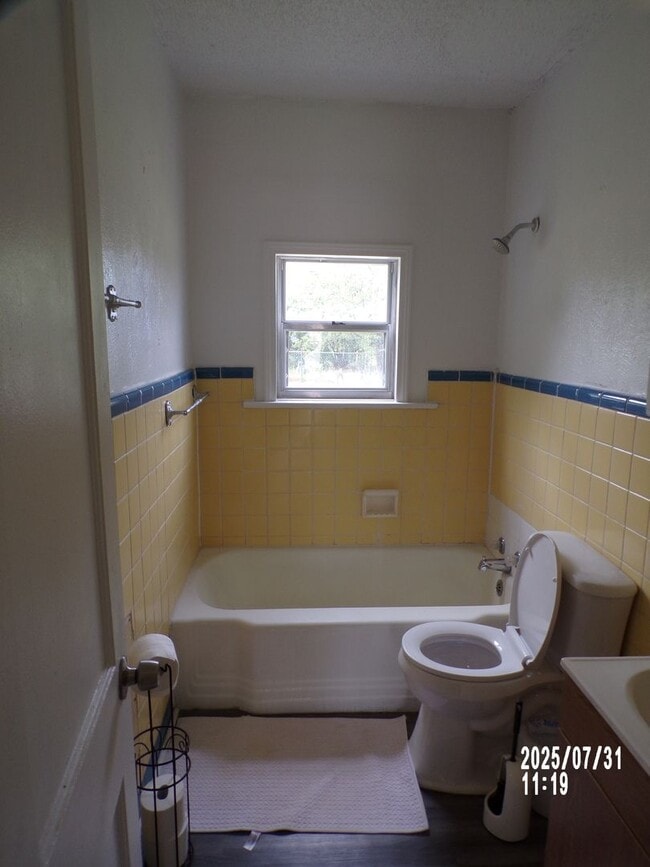 Building Photo - NEW listing-refinished hardwood floors, new laminate and paint throughout