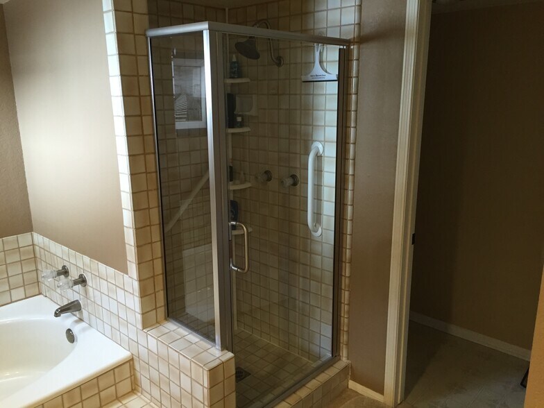 Master bathroom shower with separate toilet room (on right.) - 2094 Balboa Cir