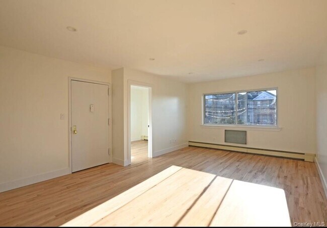Building Photo - 19-43 76th St