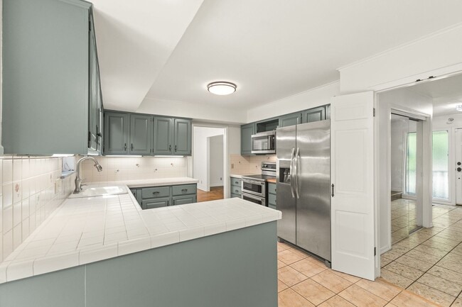 Building Photo - 4 Bedroom Home with Bonus Space, 2 Car Garage & Large Yard