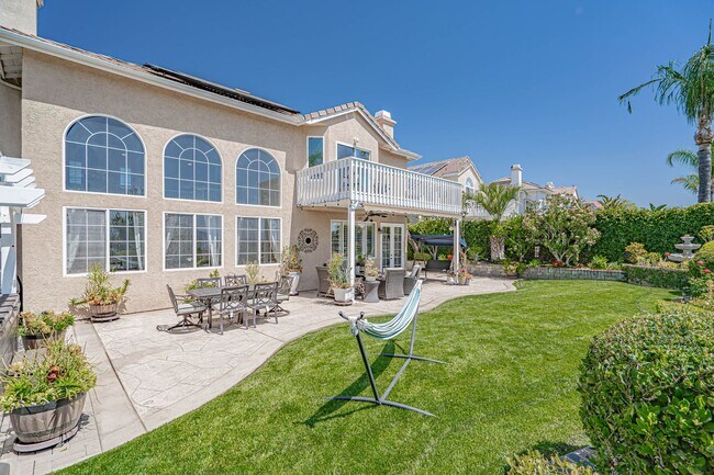Building Photo - Expansive 5-Bedroom Home with Spa & Solar ...