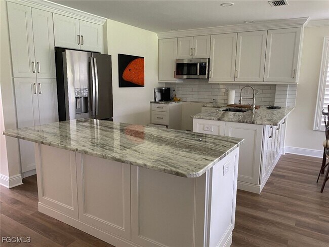 Building Photo - 8361 Grand Palm Dr