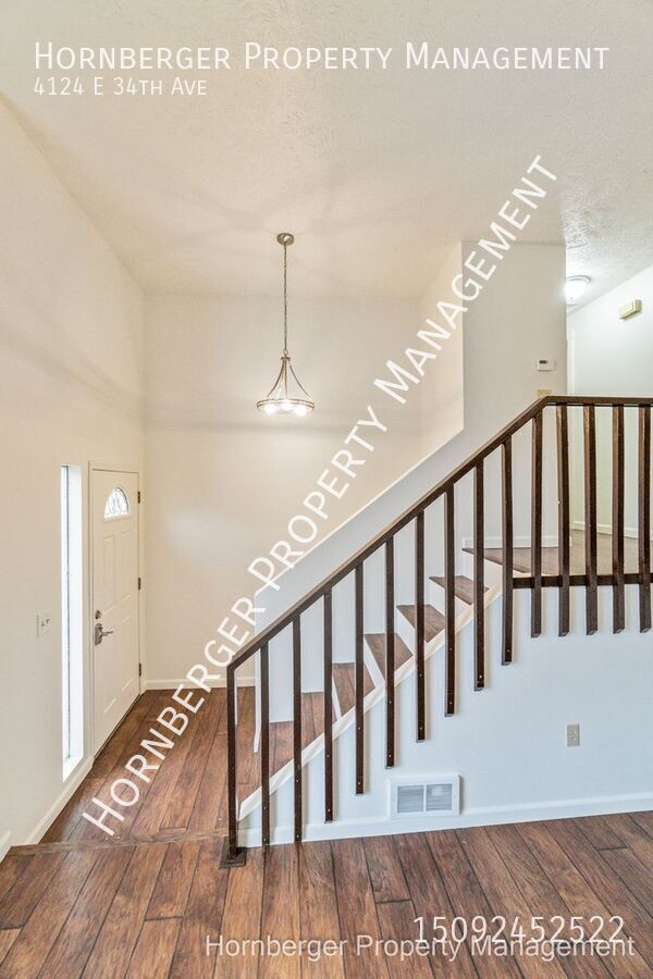 Building Photo - 4124 E 34th Ave