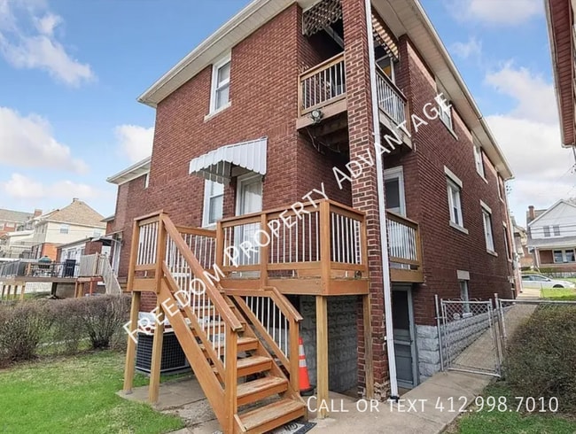 Building Photo - 1457 Tolma Ave