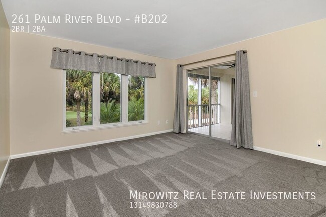 Building Photo - Beautiful 2BR/2BA Naples Condo with 1 Car ...