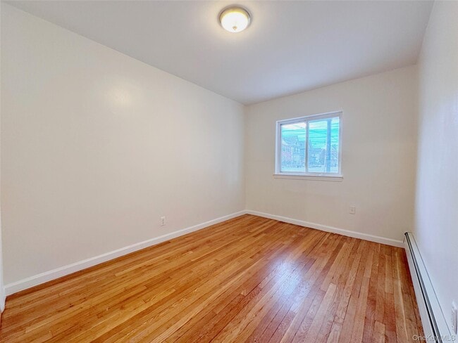 Building Photo - 117-01 14th Ave