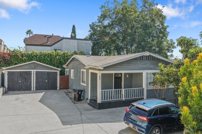 Building Photo - Stylish 2-Bedroom Retreat with Private Yar...