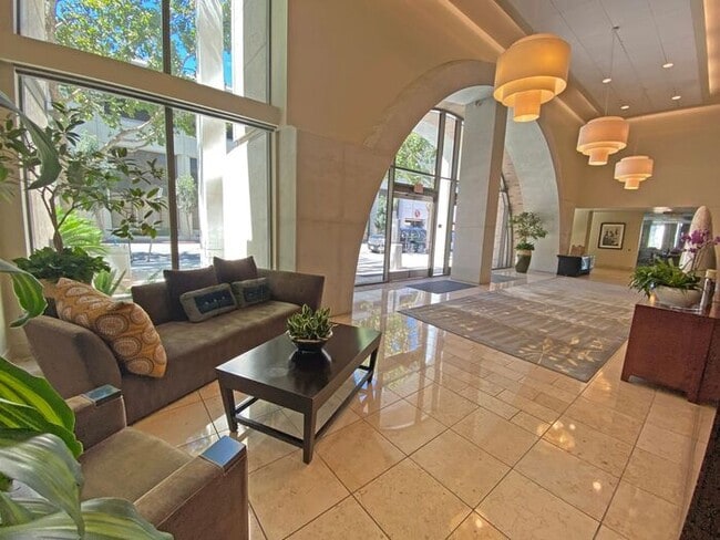Building Photo - Live at The Axis High-Rise! Upscale, Urban...