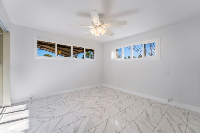 Building Photo - Single Story,  Totally Renovated , 3 bedroom, 2 bathroom Home with  extensive privacy and gated h...