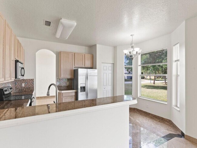 Building Photo - 4Bed/3Bath~2800 Sq Ft!~Pond View~Two Car Garage~Large Yard!